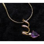 14ct gold flat link necklace marked 585 (6.80g) with spiral heart shaped amethyst and diamond set
