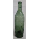 19th century green glass bottle with "kick in" base 30.5cm high