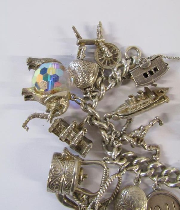 Silver charm bracelet - each link stamped - not all pendants marked - total weight 3.58ozt - Image 2 of 5