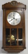 1930s oak cased wall clock