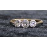 18ct gold three stone diamond ring, approx. 0.90ct, size T, 2.26g