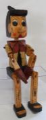 Wooden Pinocchio sitting figure 50cm high