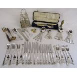 Collection of silver plate includes cutlery set