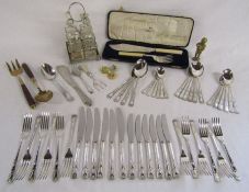 Collection of silver plate includes cutlery set