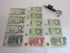 Collection of £5 and £1 notes also a shilling note and a pair of candle snuffers