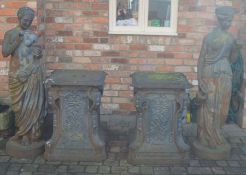 Pair or near pair of classical female cast iron statues with cast iron plinths.  Plinth Ht 83cm