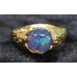 14ct opal set textured gold ring marked 585, size N, 4.34g