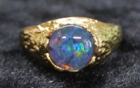 14ct opal set textured gold ring marked 585, size N, 4.34g