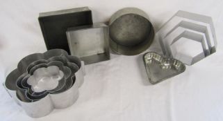 Collection of cake tins includes tiered tins