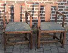 SIR FRANK BRANGWYN (1867-1956) Pair of Art & Crafts oak open arm dining chairs, from the Salle