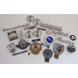 Collection of car badges includes Morris Oxford, Vauxhall, Morris Minor, BARC (British Automobile