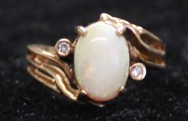 Tested as 15ct opal & diamond ring, 5.3g, size P
