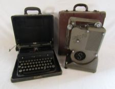 Cased Royal typewriter and Specto projector