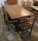 1930's Jacobean revival oak refectory table 165cm by 97cm with six carved chairs