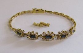 18ct (750) gold sapphire and diamond bracelet - 5 clusters each having marquise cut sapphire approx.