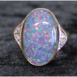 14ct ring marked 585 set with opal triplet & diamond chip shoulders 5.8g - ring size N