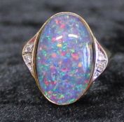 14ct ring marked 585 set with opal triplet & diamond chip shoulders 5.8g - ring size N