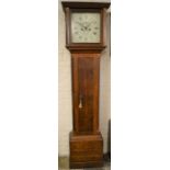 Georgian long case clock by Bothamly of Boston with an 8 day movement in an oak case with a