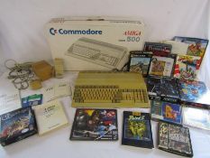 Commodore Amiga model 500 with games including ZOOL, terminator 2, Bloodwych etc