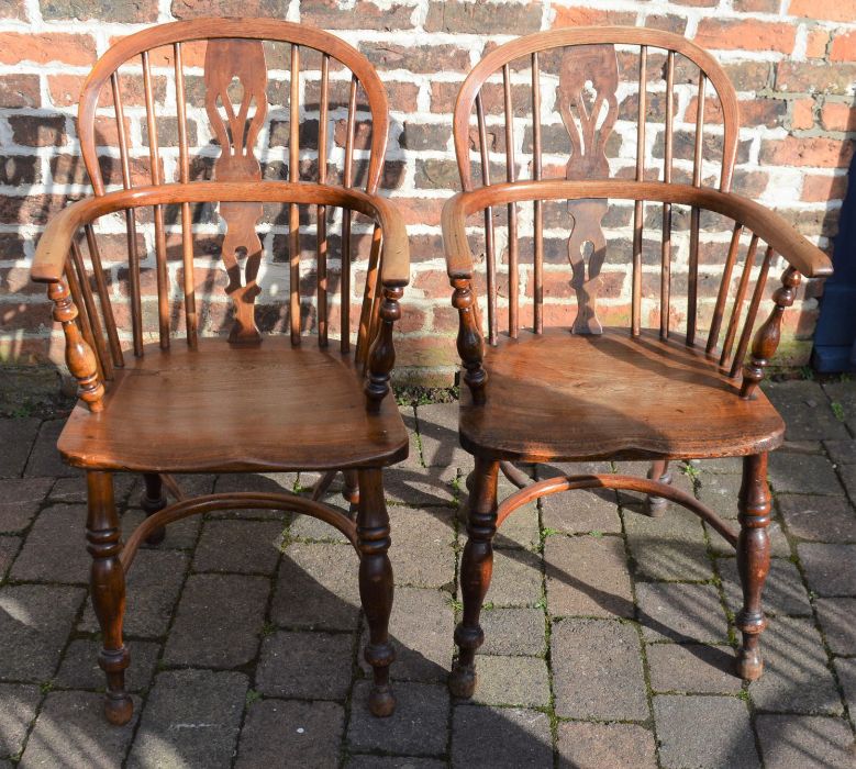 *Pair of Victorian Windsor chairs with crinoline stretchers .  This lot is subject to VAT.