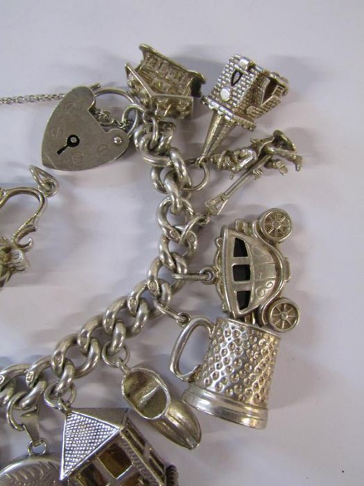 Silver charm bracelet - each link stamped - not all pendants marked - total weight 3.58ozt - Image 4 of 5