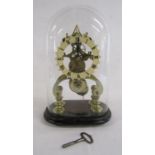 Skeleton clock with glass dome and key approx. 33cm high from floor to top of dome