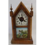 Late 19th century American mantel clock with architectural form case and lower illustrated glass