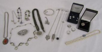 Collection of sterling hallmarked silver jewellery includes 925 rings and amethyst silver necklace