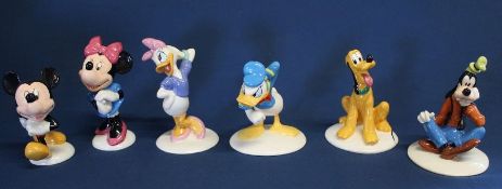 Set of six Royal Doulton 70th Anniversary Mickey Mouse Collection figurines: Goofy, Pluto, Donald