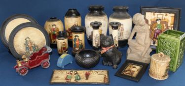 Quantity of Bretby pottery including buff coloured boy sitting on a rock & a seated cat