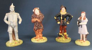 Set of four limited edition Royal Doulton Wizard of Oz figurines: Dorothy 4112 / 1500, Scarecrow 111