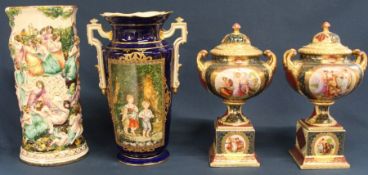 Pair of early 20th century transfer printed & gilded twin handled baluster vases on square