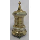 Italian gilt metal & onyx pagoda shaped musical cigarette dispenser (not currently working as the