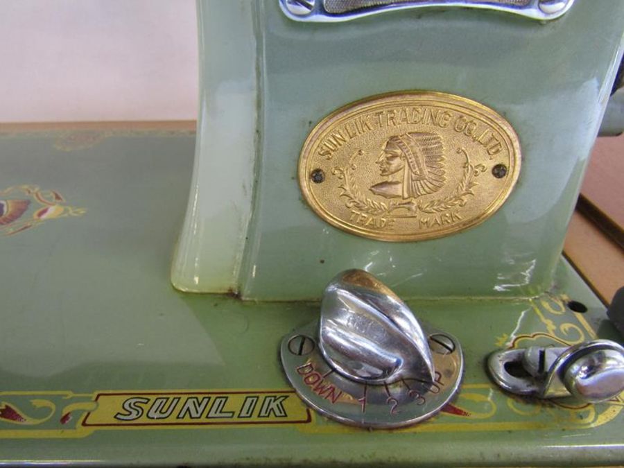 Musical Sunlik sewing machine includes attachments and instructions (no power or foot pedal) - Image 7 of 13