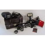 Nikon F camera with National PE-5650 flash, Vivitor 550fd auto thyristor, National power pack,