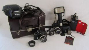 Nikon F camera with National PE-5650 flash, Vivitor 550fd auto thyristor, National power pack,