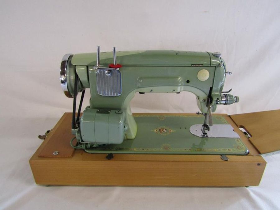 Musical Sunlik sewing machine includes attachments and instructions (no power or foot pedal) - Image 12 of 13