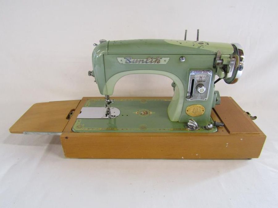 Musical Sunlik sewing machine includes attachments and instructions (no power or foot pedal) - Image 4 of 13