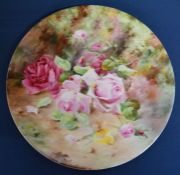 Royal Worcester charger decorated with hand painted roses. Dia 30.5cm