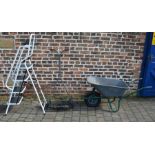 Push mower, step ladder & a wheel barrow