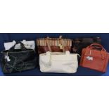 Six Radley leather handbags