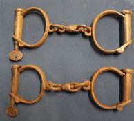 Two pairs of steel handcuffs