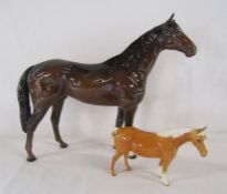 Large Beswick horse (damaged ear) approx. 30.5cm tall and a smaller palomino Beswick horse