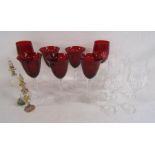 Red glass wine glasses, crystal glasses and 2 scent bottles