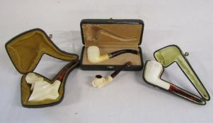 Collection of Meerschaum pipes includes eagle, and ball and claw