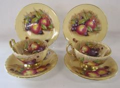 Aynsley Orchard Gold crimped edge pair of cup and saucers signed N Brunt and 2 side plates signed