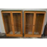 Pair of modern display cabinets with glass shelves Ht 124cm W 83cm D 31cm
