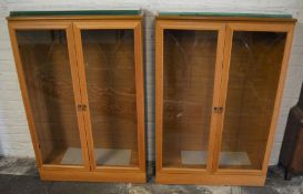 Pair of modern display cabinets with glass shelves Ht 124cm W 83cm D 31cm