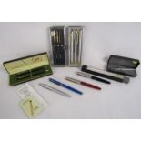 Collection of pens to include Cross pen set, Calibri, Fisher space pen, Parker etc