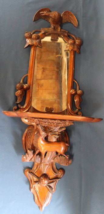 Late 19th / early 20th century Black Forest carved eagle / deer shelf mirror with fruit and leaf
